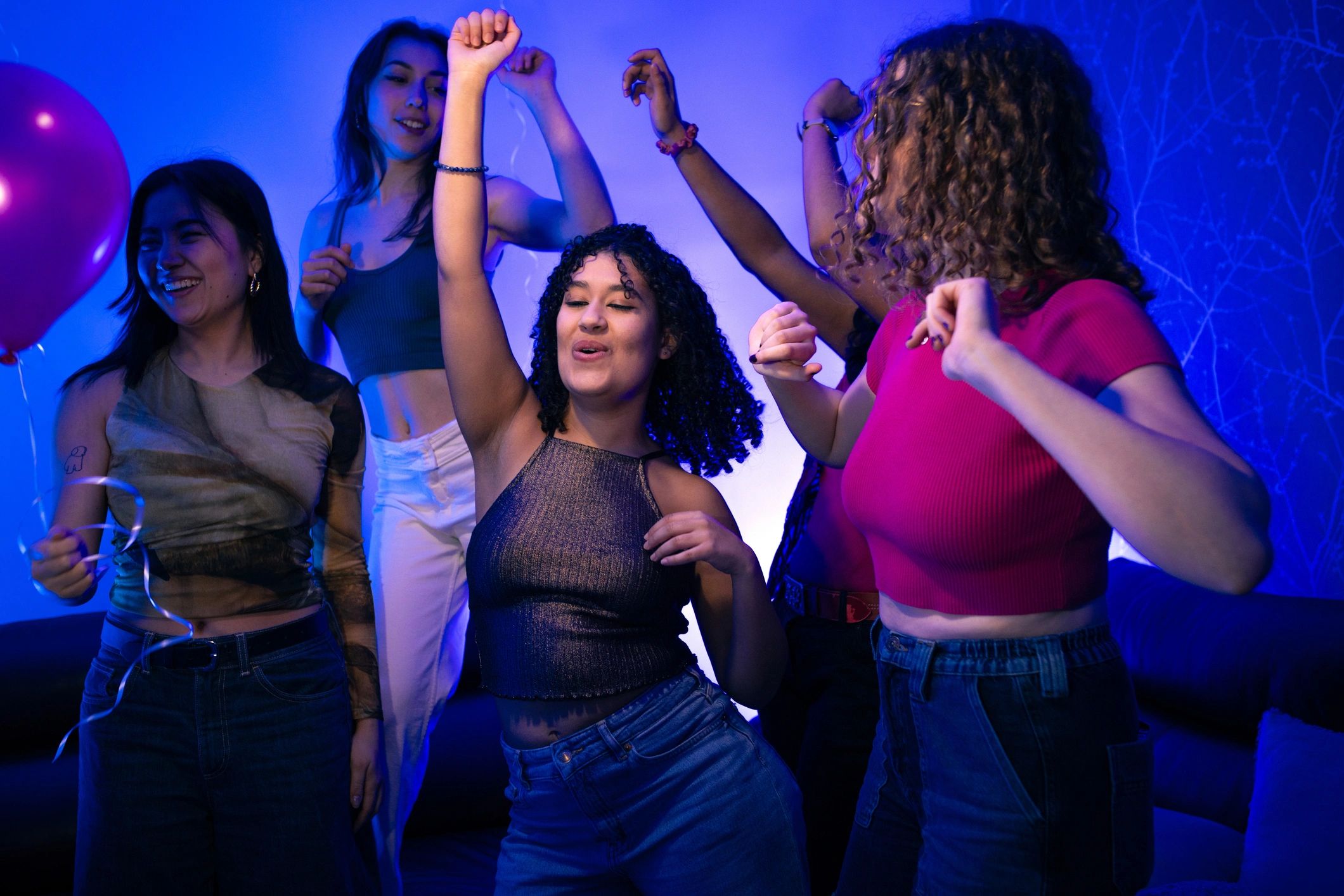 Friends dancing at a lively celebration