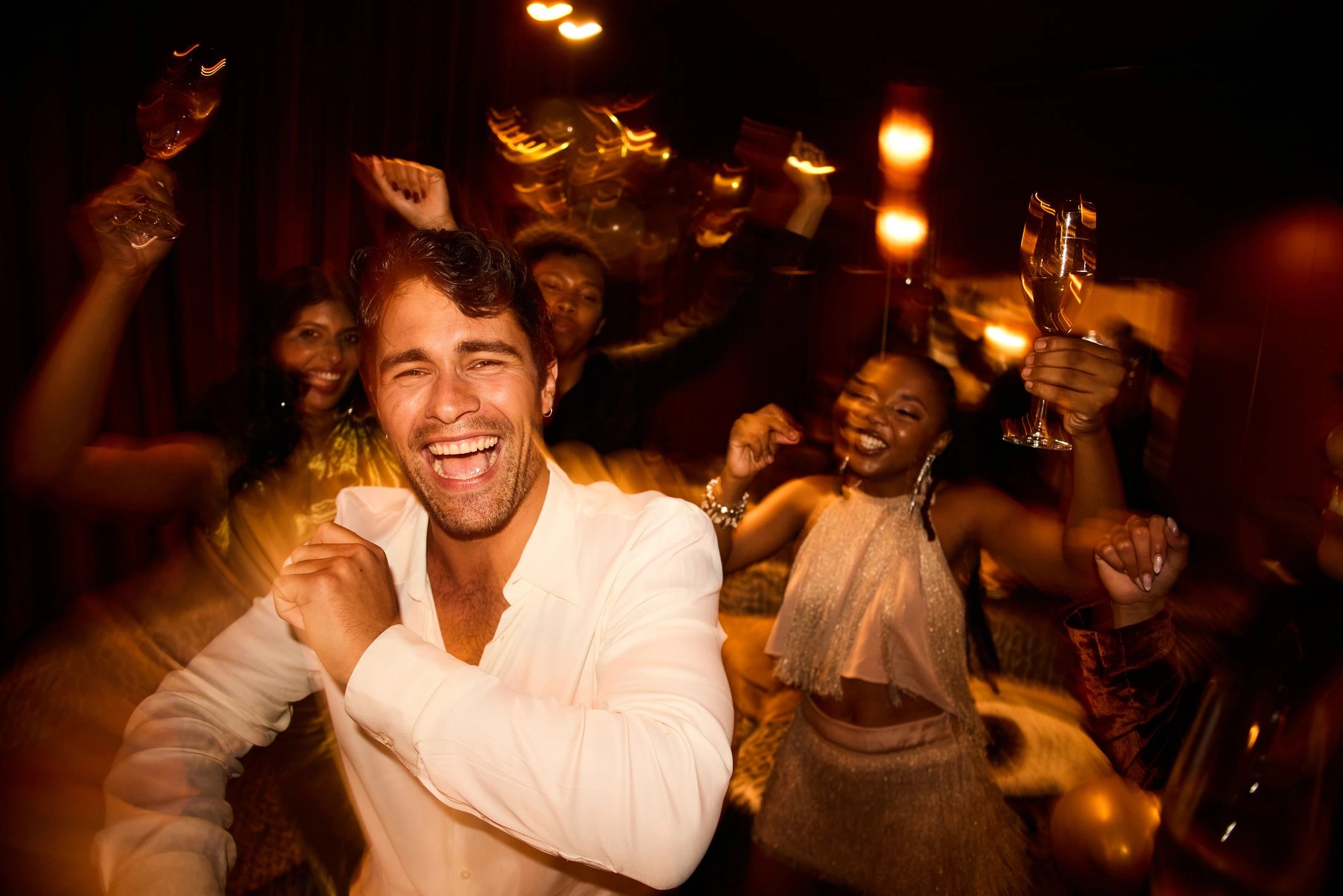 Friends dancing at a celebration