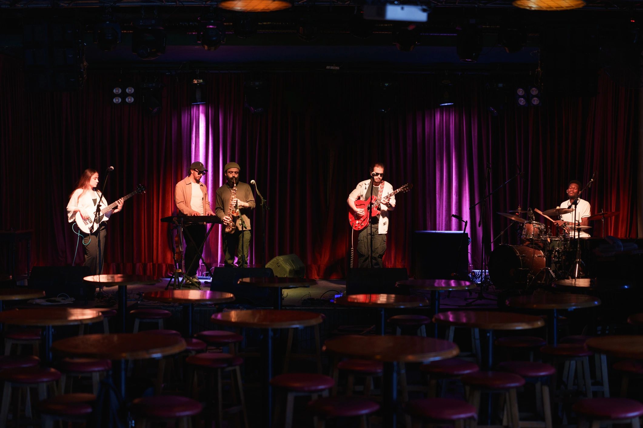 Band performing live in a music venue
